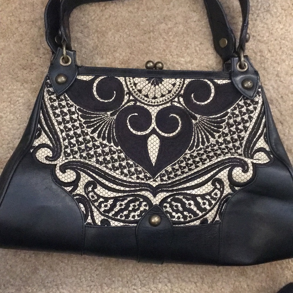 Black and sand colored Isabella Fiore handbag